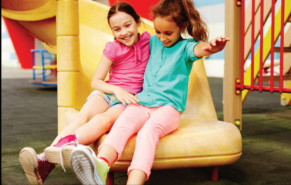 Children playing at the kids play area